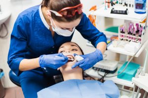 A patient getting dental help in a dental office.