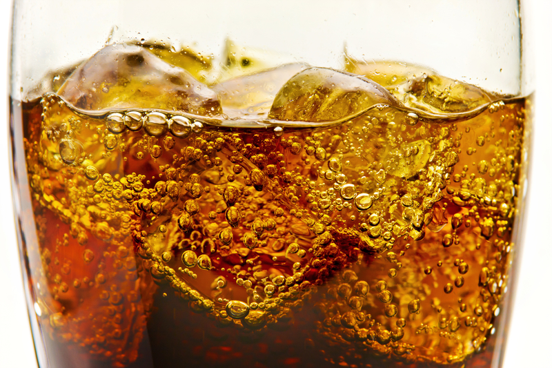 Close-up view of soda that has bubbling carbonation