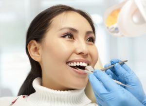 cleaning gums at a dental cleaning