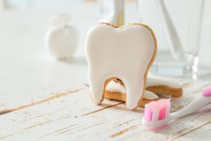 picture of a tooth and a toothbrush
